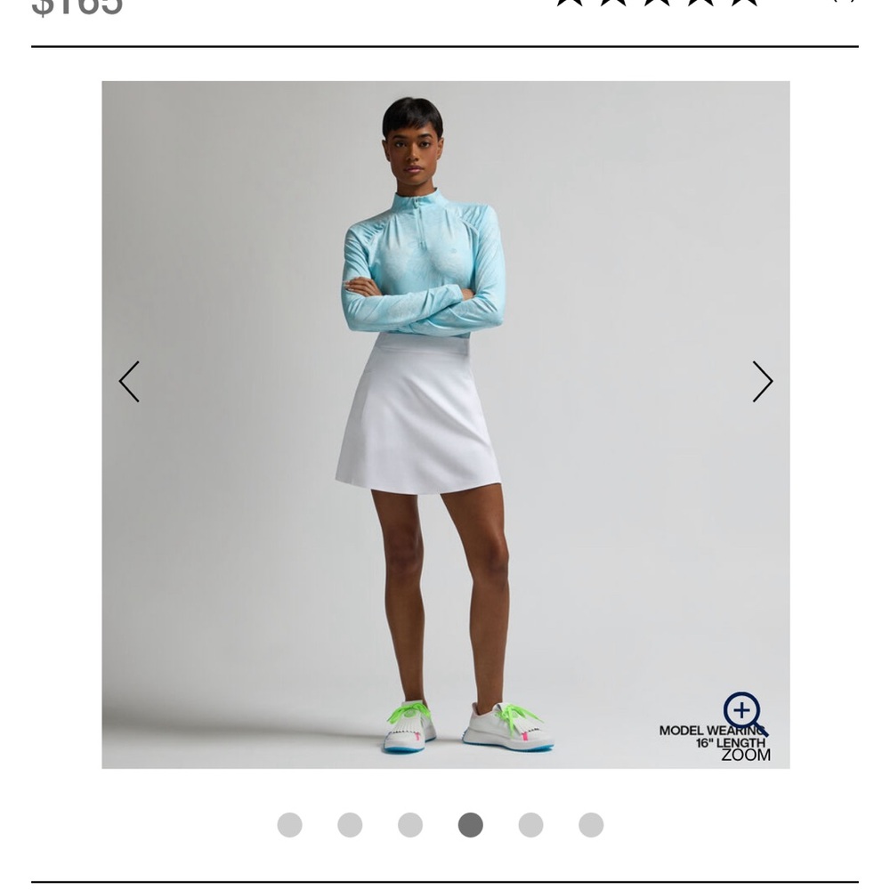 Women’s white G/Fore golf skort never worn with tags size medium.